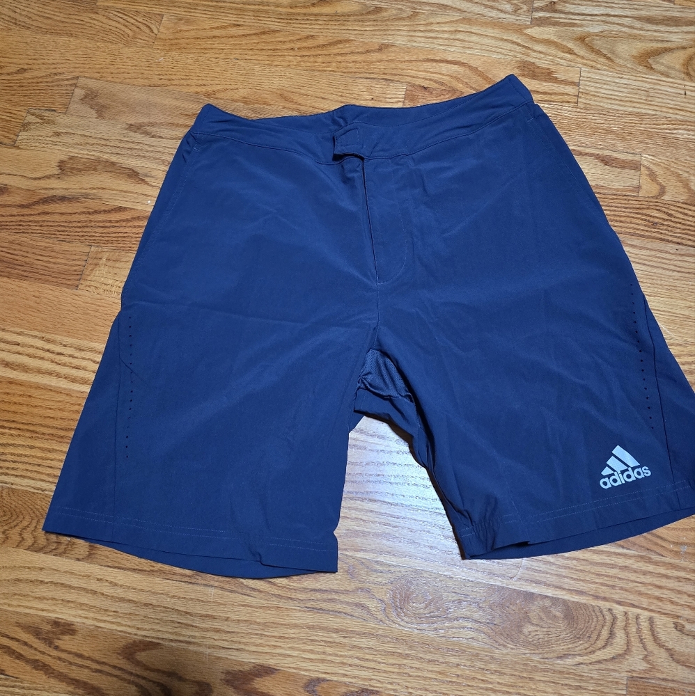 Men's barricade adidas navy blue shorts size large.